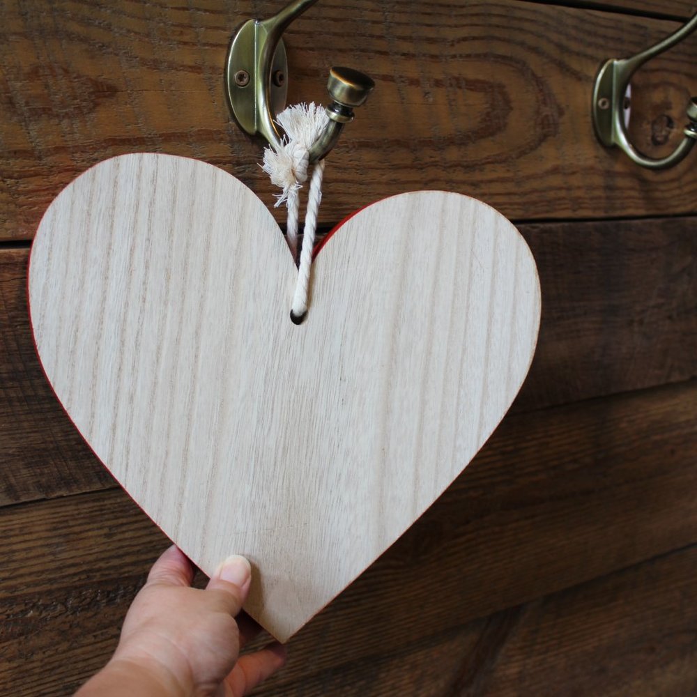 Large wooden hanging heart "cutting board" decoration with red edges